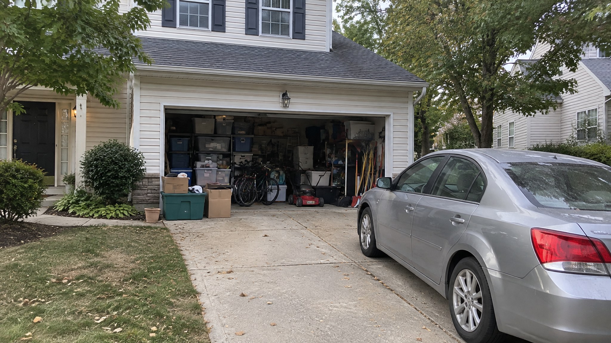 Cluttered garage before a Waterloo Products shed in southeastern Pennsylvania